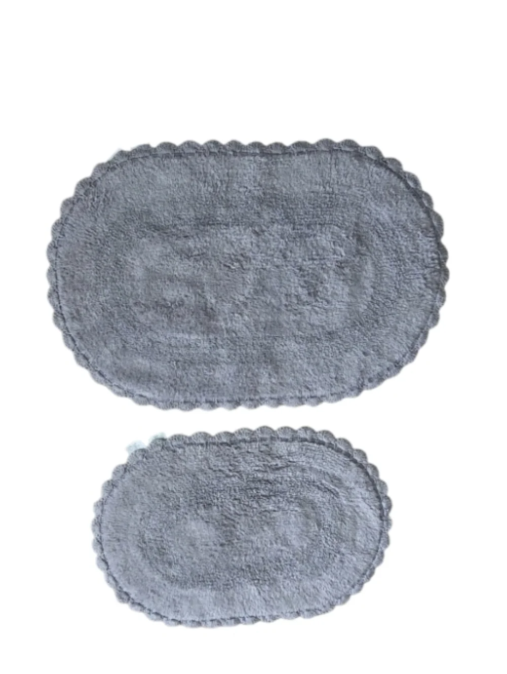 2-piece set of oval cotton bath rugs featuring a crochet border
